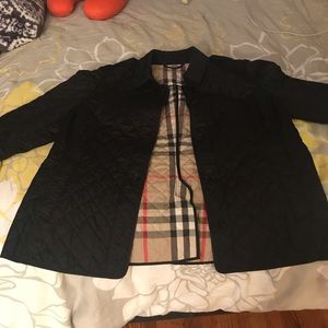 Women’s Burberry quilted trench jacket.